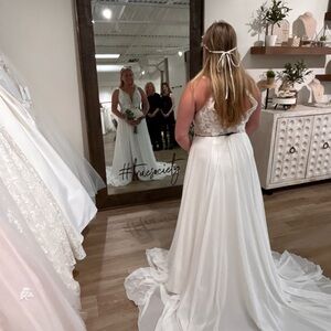 Beautiful wedding gown. Barely worn. Size 12, minimal alterations.